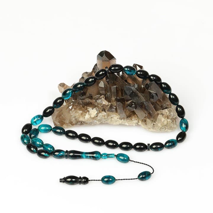 Turkuaz Rengi-Siyah Sıkma Kehribar Tesbih (7×11 mm)